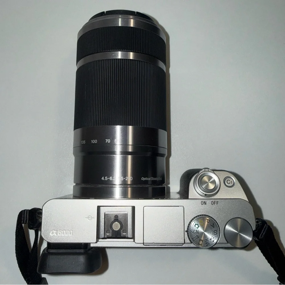 Sony a6000 - 24.3 MP Mirrorless Camera Body & 55‑210mm OSS Lens - Silver
